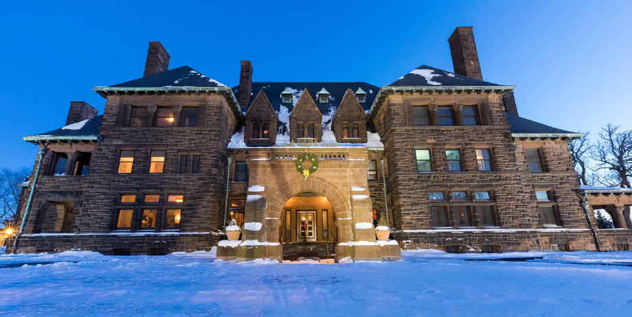 Hill house on a snowy night