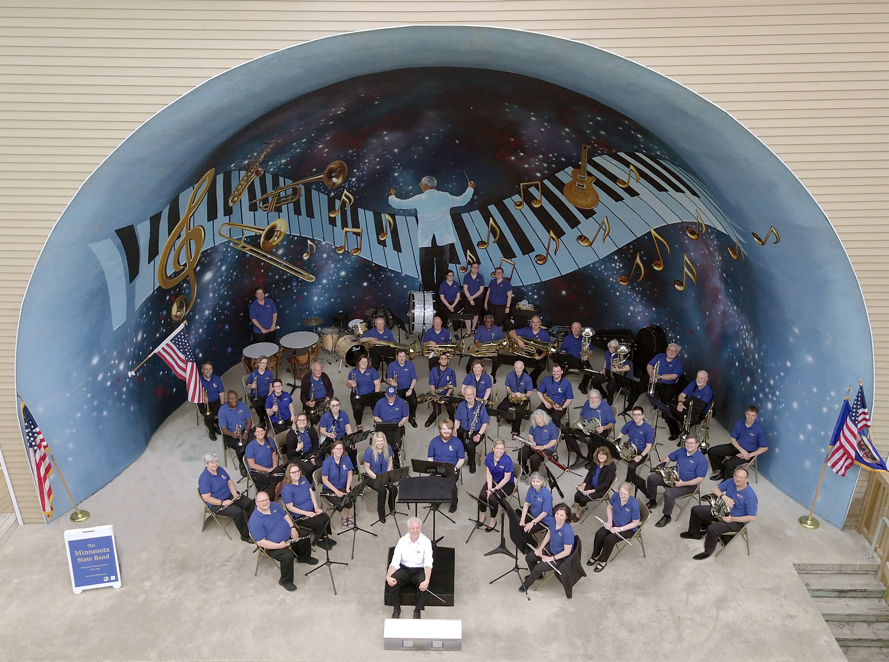 Minnesota State Band seated in amphitheater, shown from above